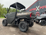 pic of a segway ut10s utv in front of super x power a segway powersports dealer in milaca minnesota