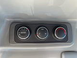 heater control knobs in the cab of an LS MT240HEC tractor