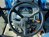 Inside look of operator controls on an MT357HC LS Tractor in MN